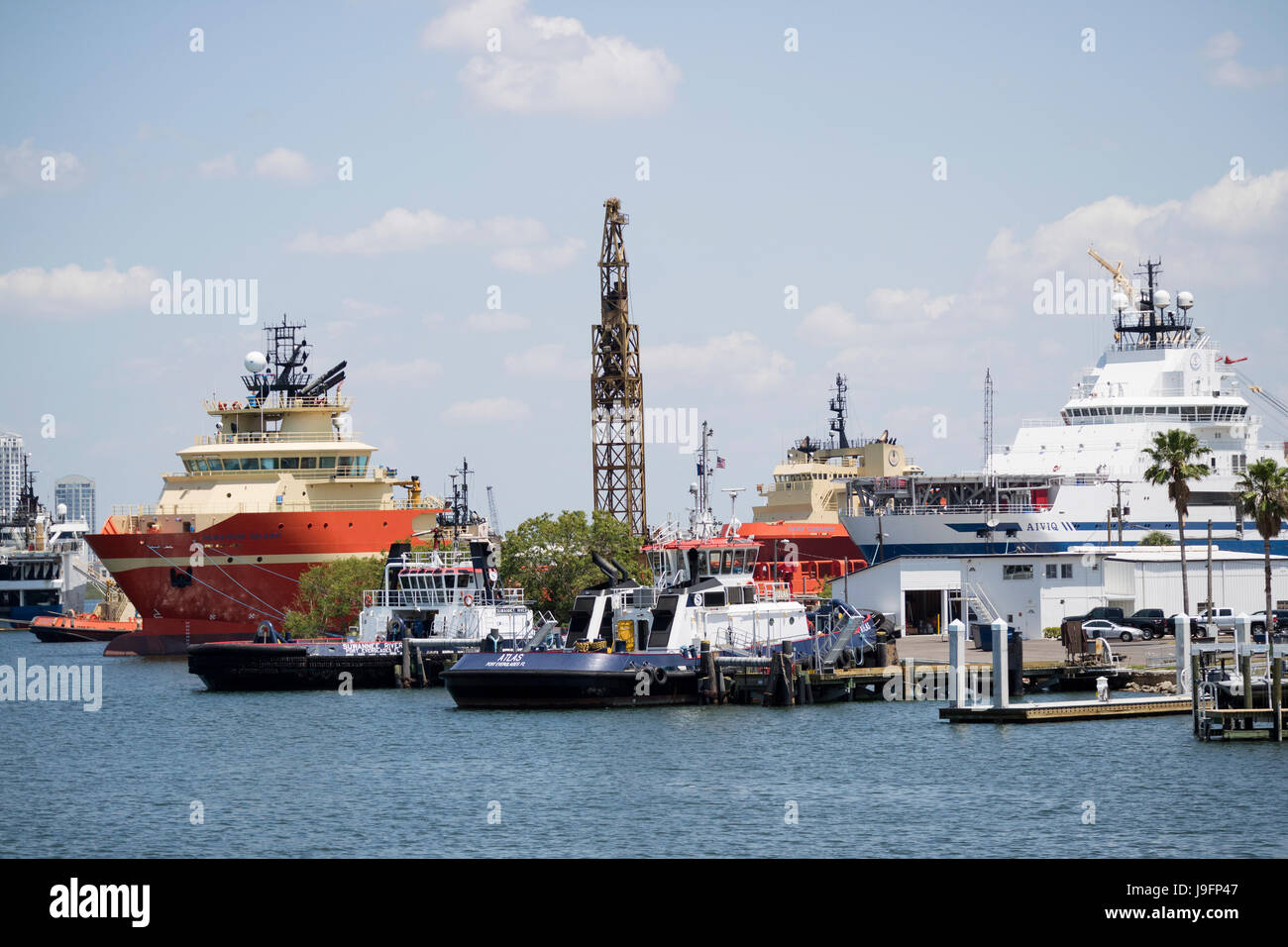 Tugs and offshore supply ships alongside in the Port of Tampa Florida USA. April 2017 Stock Photo