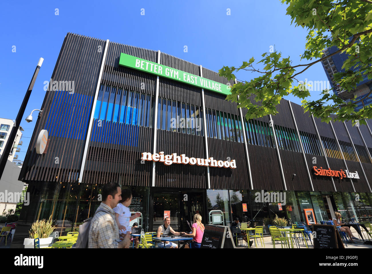 'Neighbourhood store' on Celebration Avenue in trendy East Village, former home of the Olympic athletes, in Stratford E20, east London, UK Stock Photo