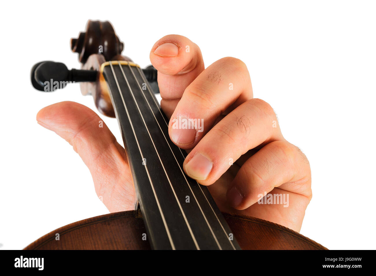 Image violin lies in a human hand.String instrument isolated on white