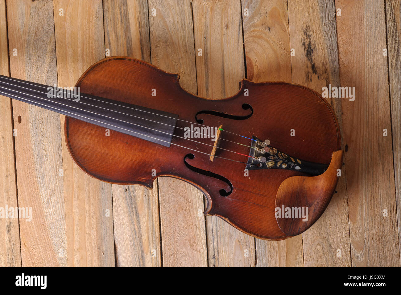 one violin image .old brown stringed wooden instrument isolated on the ...