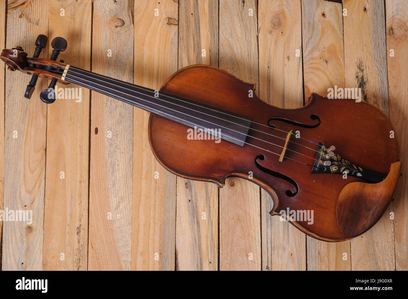 one violin image .old brown stringed wooden instrument isolated on the ...