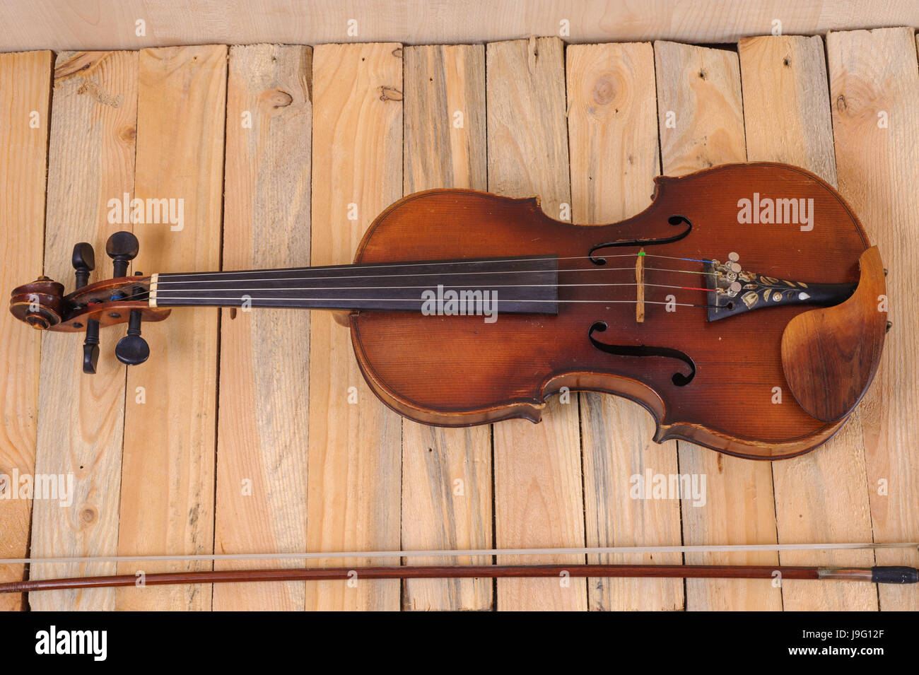 one violin image .old brown stringed wooden instrument isolated on the ...