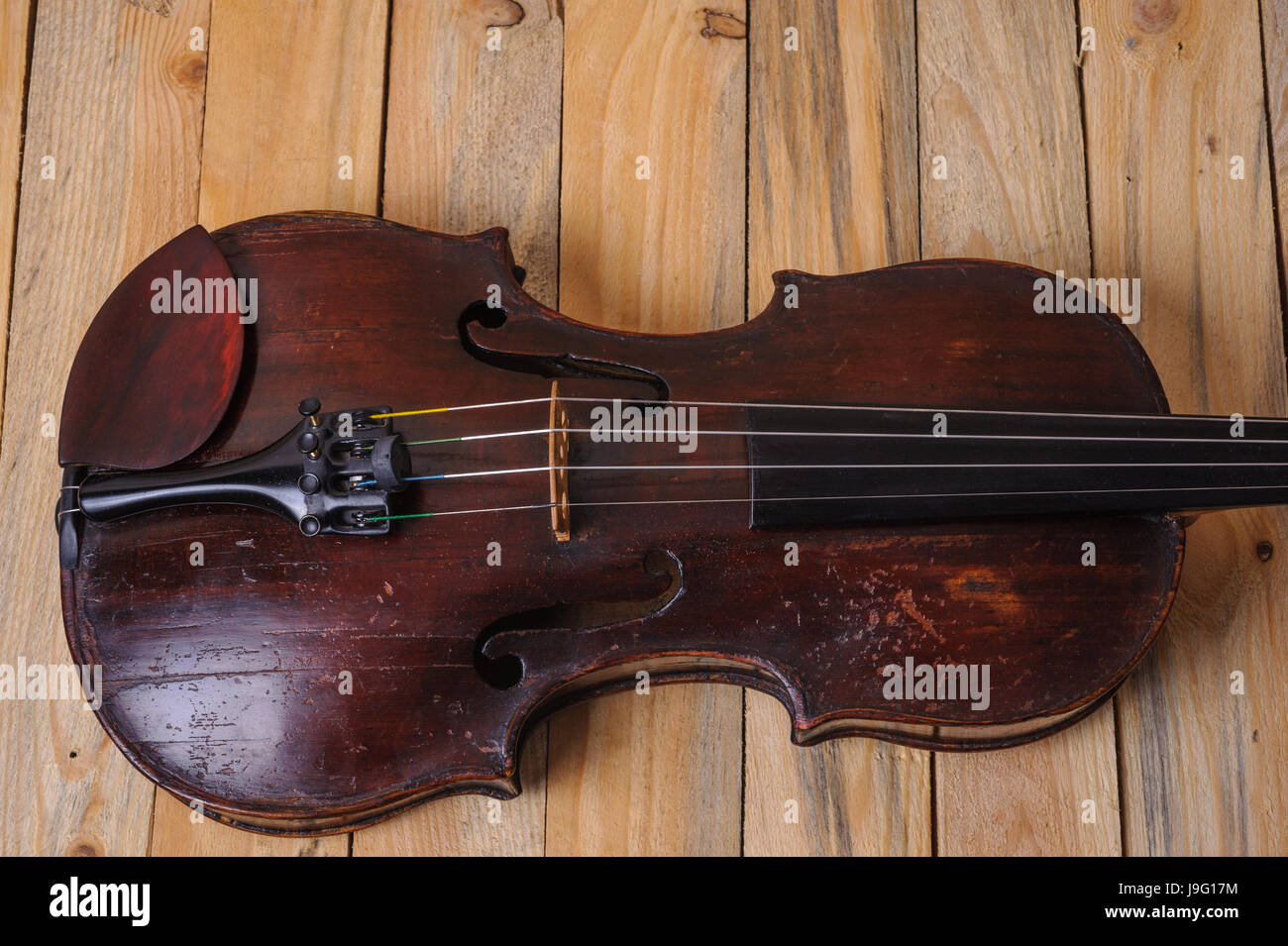 one violin image .old brown stringed wooden instrument isolated on the ...