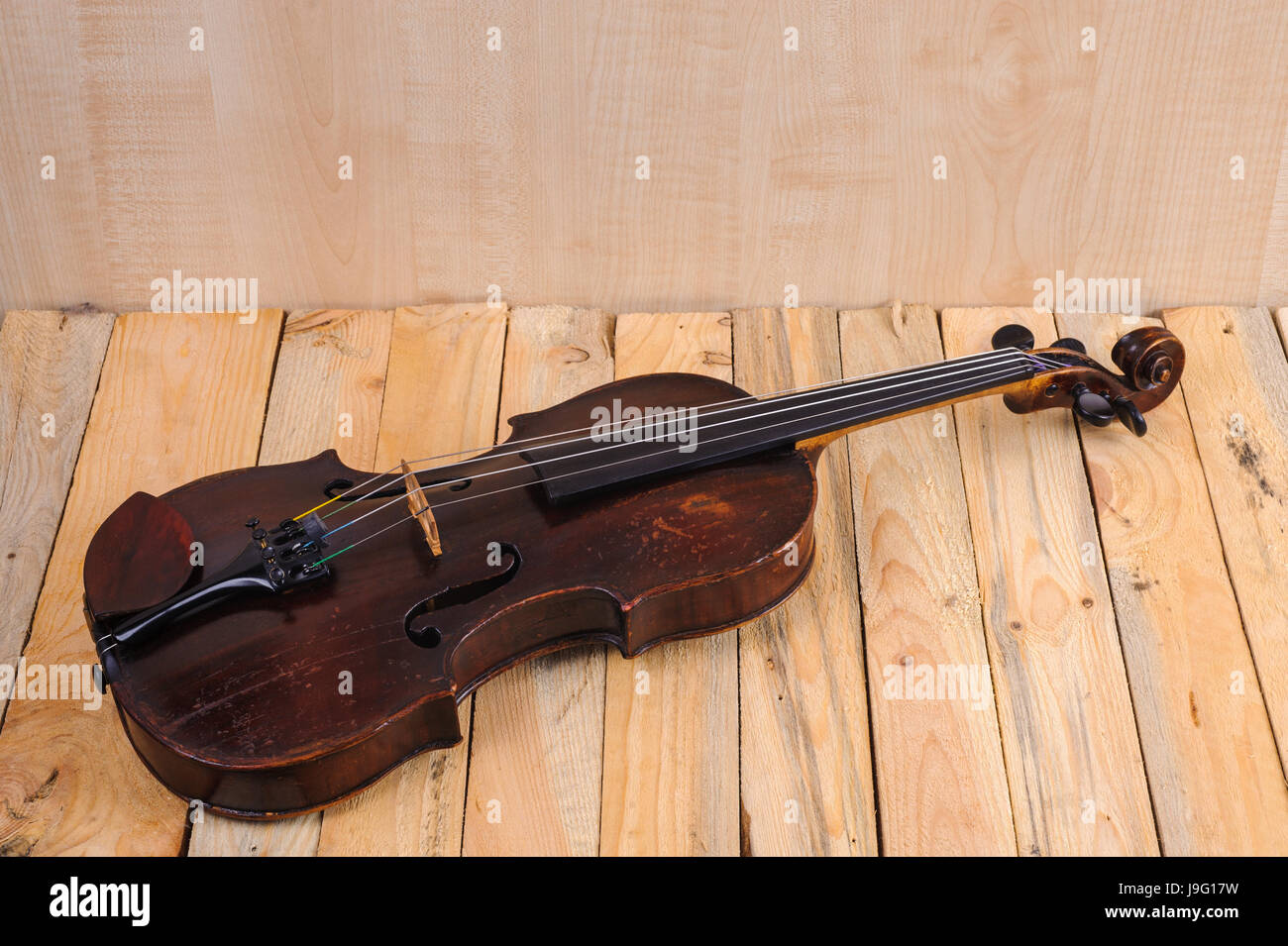 one violin image .old brown stringed wooden instrument isolated on the ...