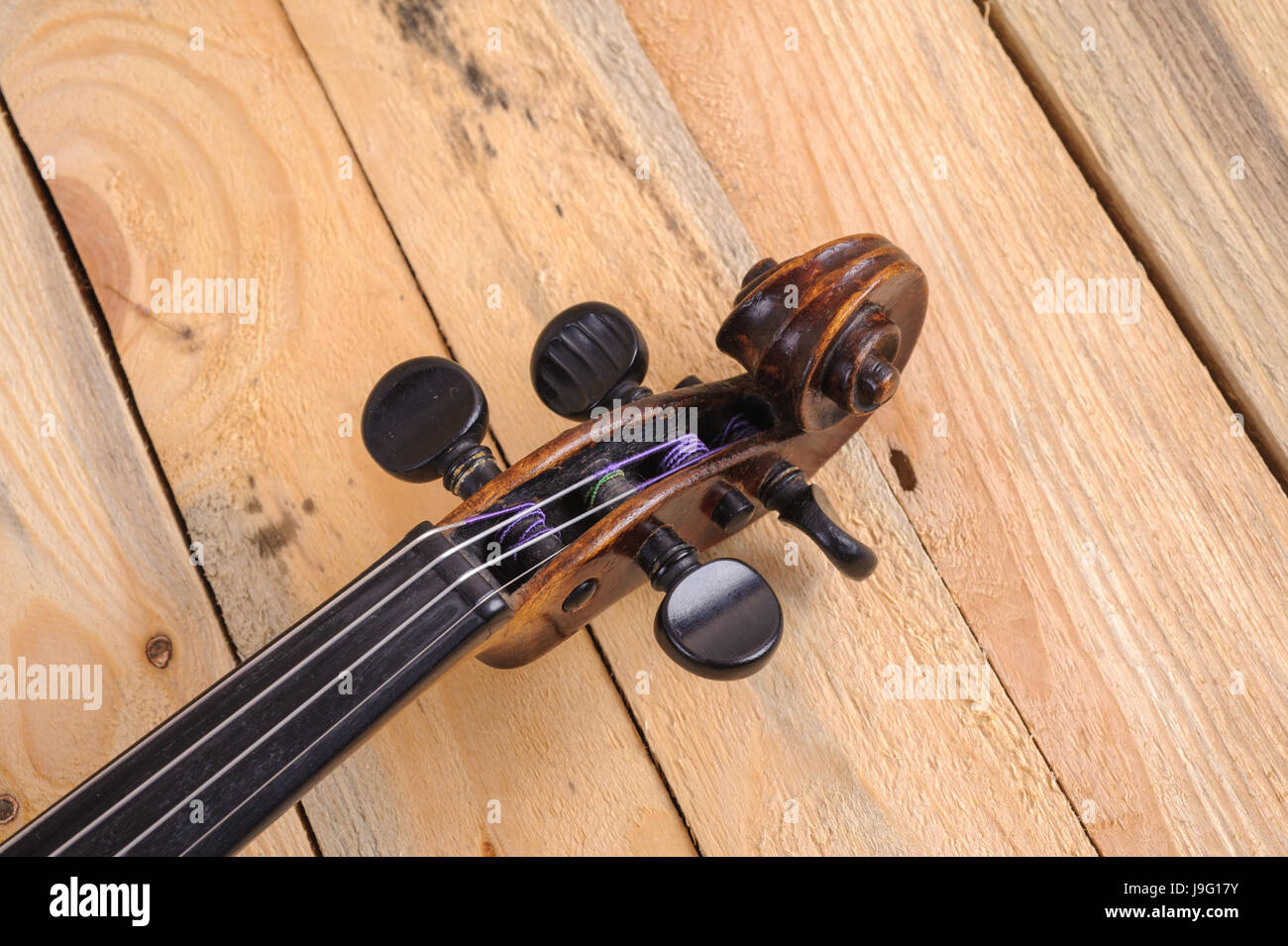 one violin image .old brown stringed wooden instrument isolated on the ...