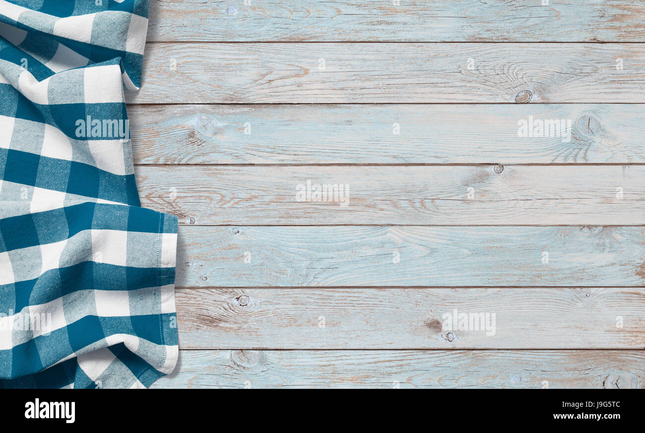 blue picnic cloth on wood table Stock Photo