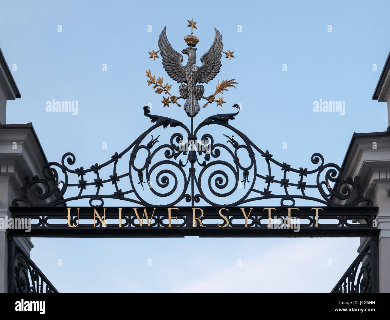 Main gate to the University of Warsaw campus (view from outside), Warsaw, Poland Stock Photo