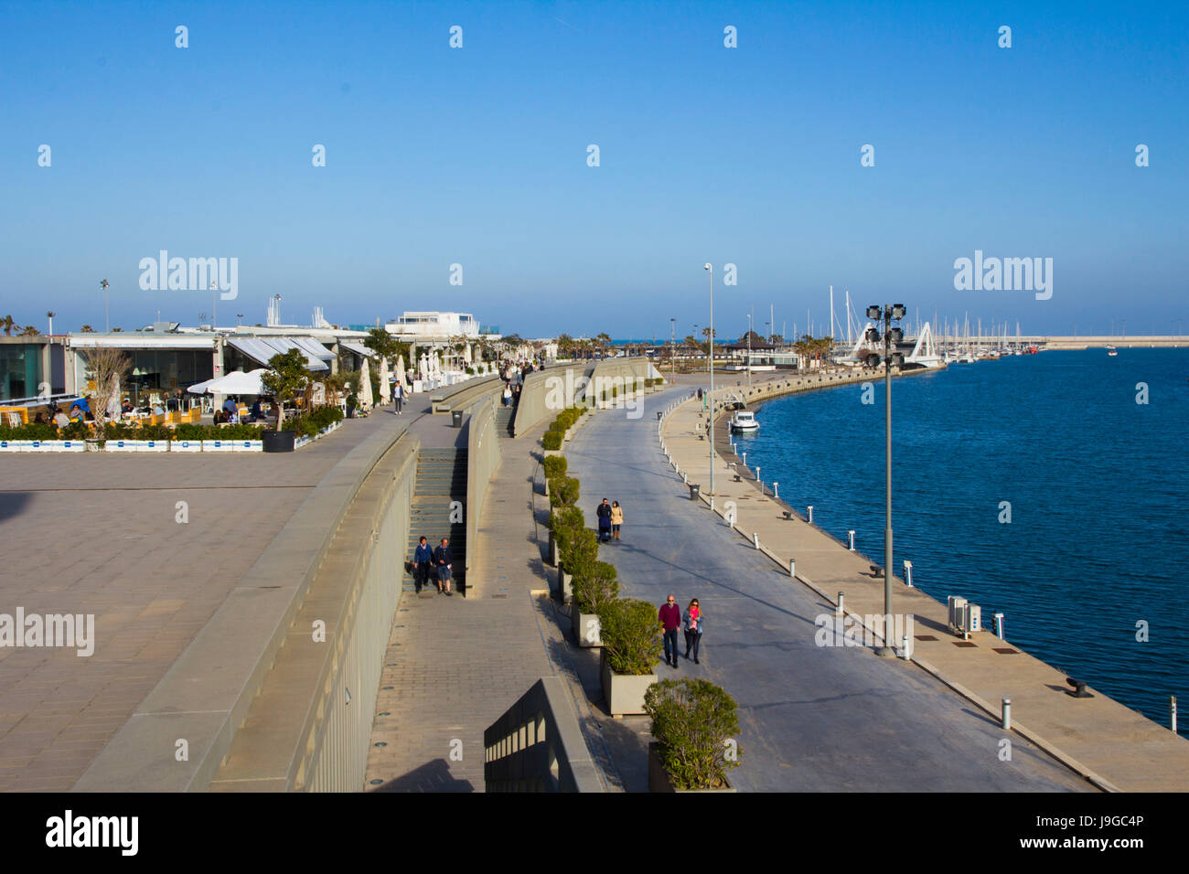 The promenade along Juan Carlos l Royal Marina in Valencia, Spain. Stock Photo