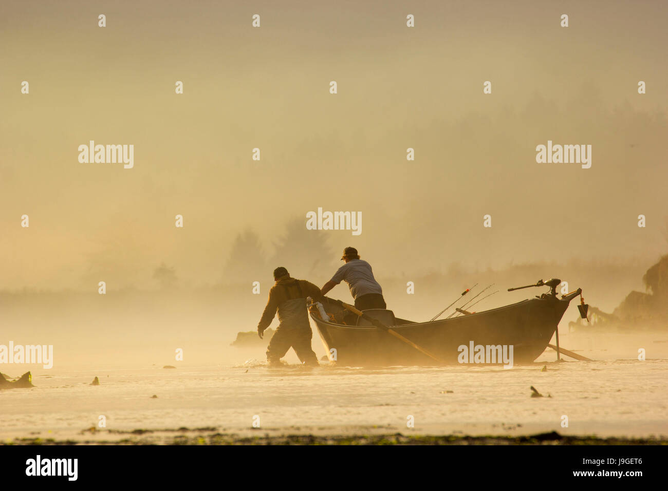 Driftboat on Salmon River estuary with fog, Cascade Head Scenic