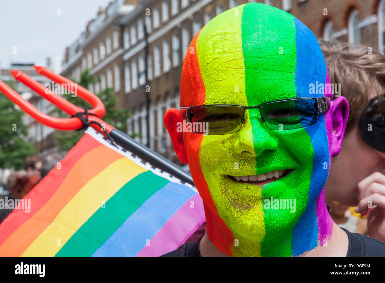 England, London, The Annual Gay Pride Parade, Man with Face Painted in