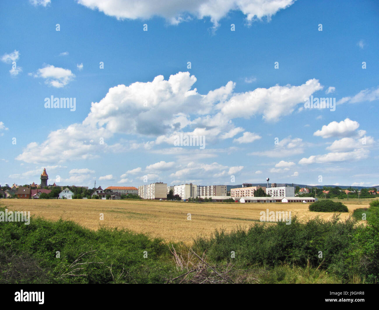View of the small city from window of train Stock Photo