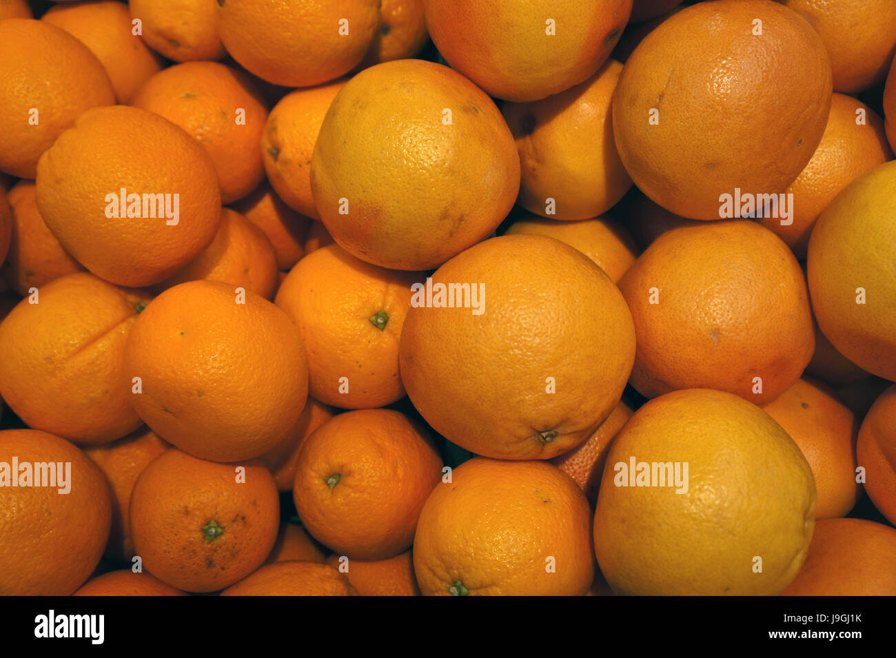 A bunch of oranges in market Stock Photo Alamy