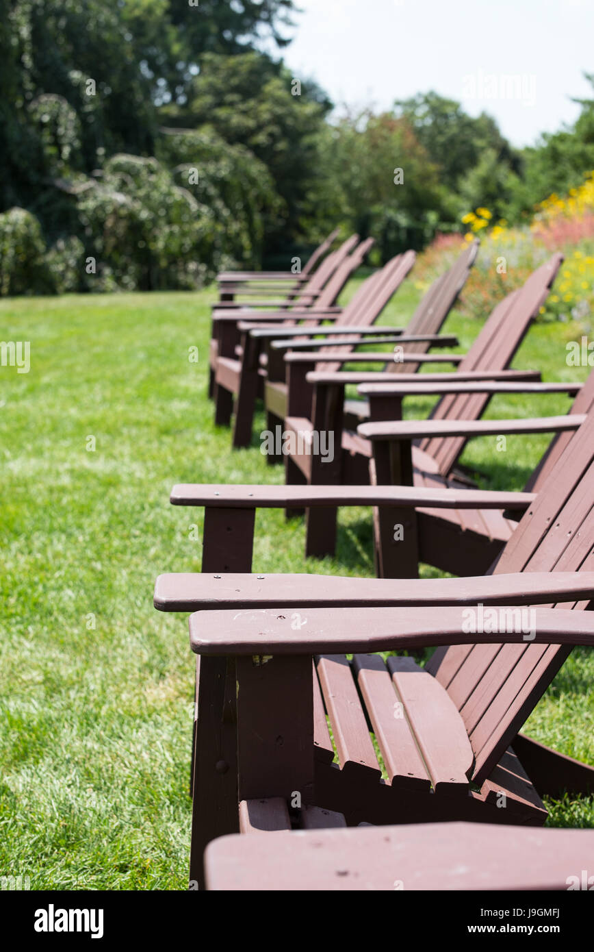 adirondack chairs in park setting Stock Photo Alamy