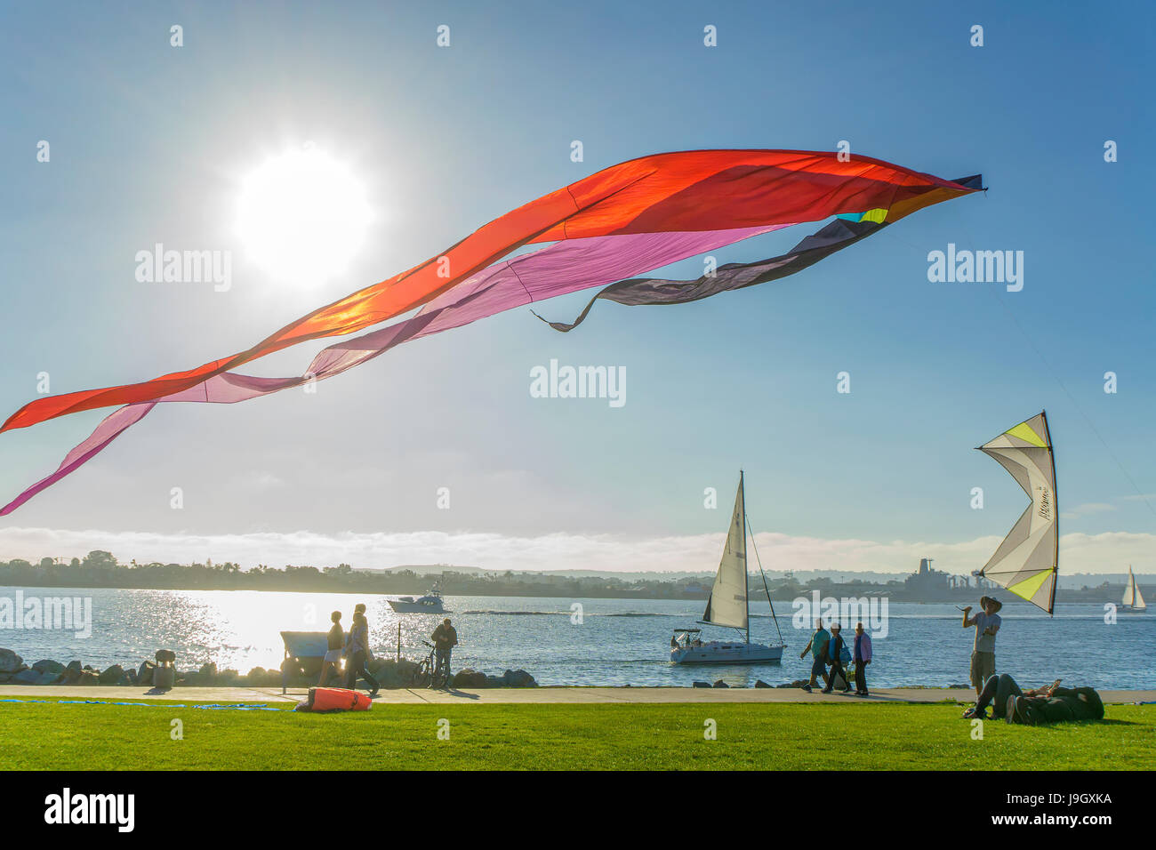 Kites soaring at Seaport Village in San Diego, California Stock Photo
