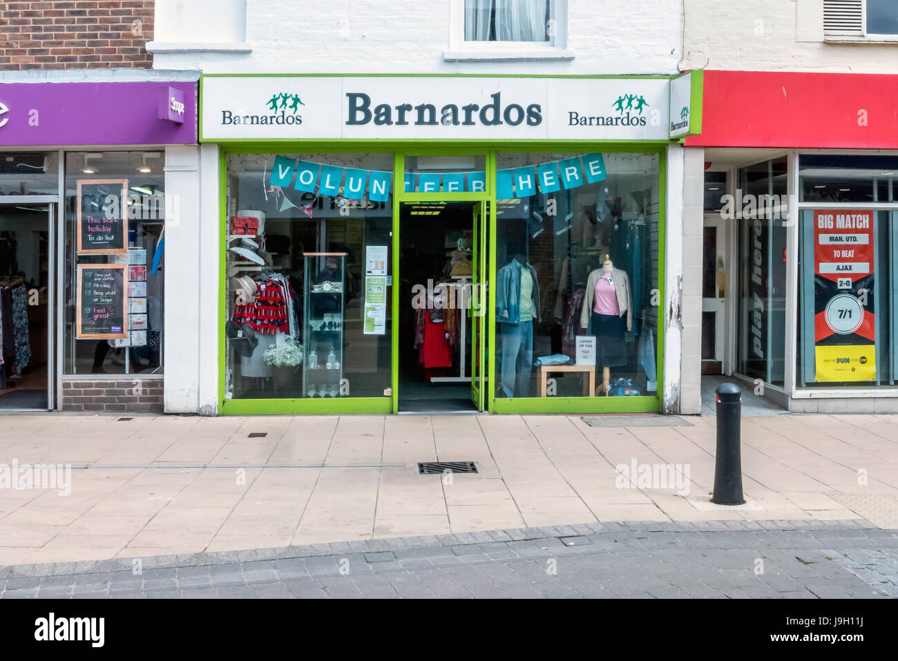 Charity shops in Hove's Street Stock Photo Alamy