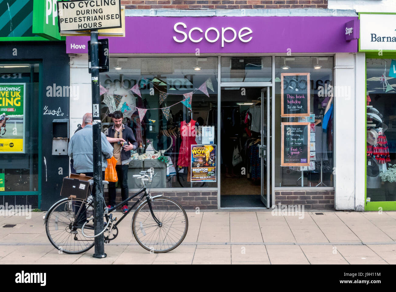 Charity shops in Hove's Street Stock Photo Alamy