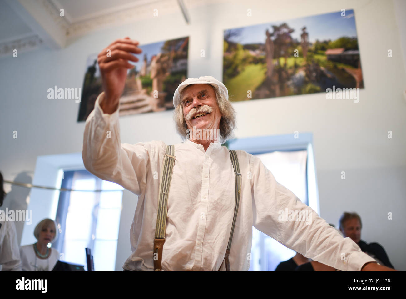 Artist Peter Lenk in his exhibition 'Peter Lenk - 40 years of trouble and winking' in the city gallery in Uberlingen am Bodensee, Germany, 01 June 2017. The exhibition runs between 02 June and 15 October 2017. Photo: Felix Kästle/dpa Stock Photo