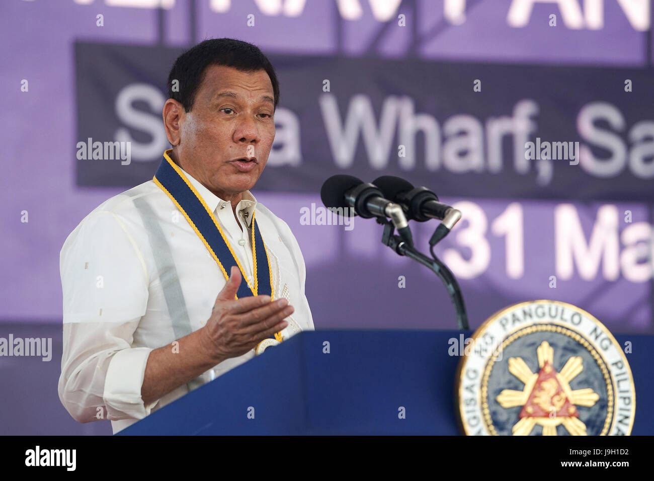 Philippine President Rodrigo Duterte delivers an address on the 119th Anniversary Celebration of the Philippine Navy at the Sasa Wharf May 31, 2017 in Davao City, Mindanao, Philippines. Duterte called to eradicate the emergence of violence extremists in the country as the government battles ISIS forces in Marawi City in Mindanao. Stock Photo