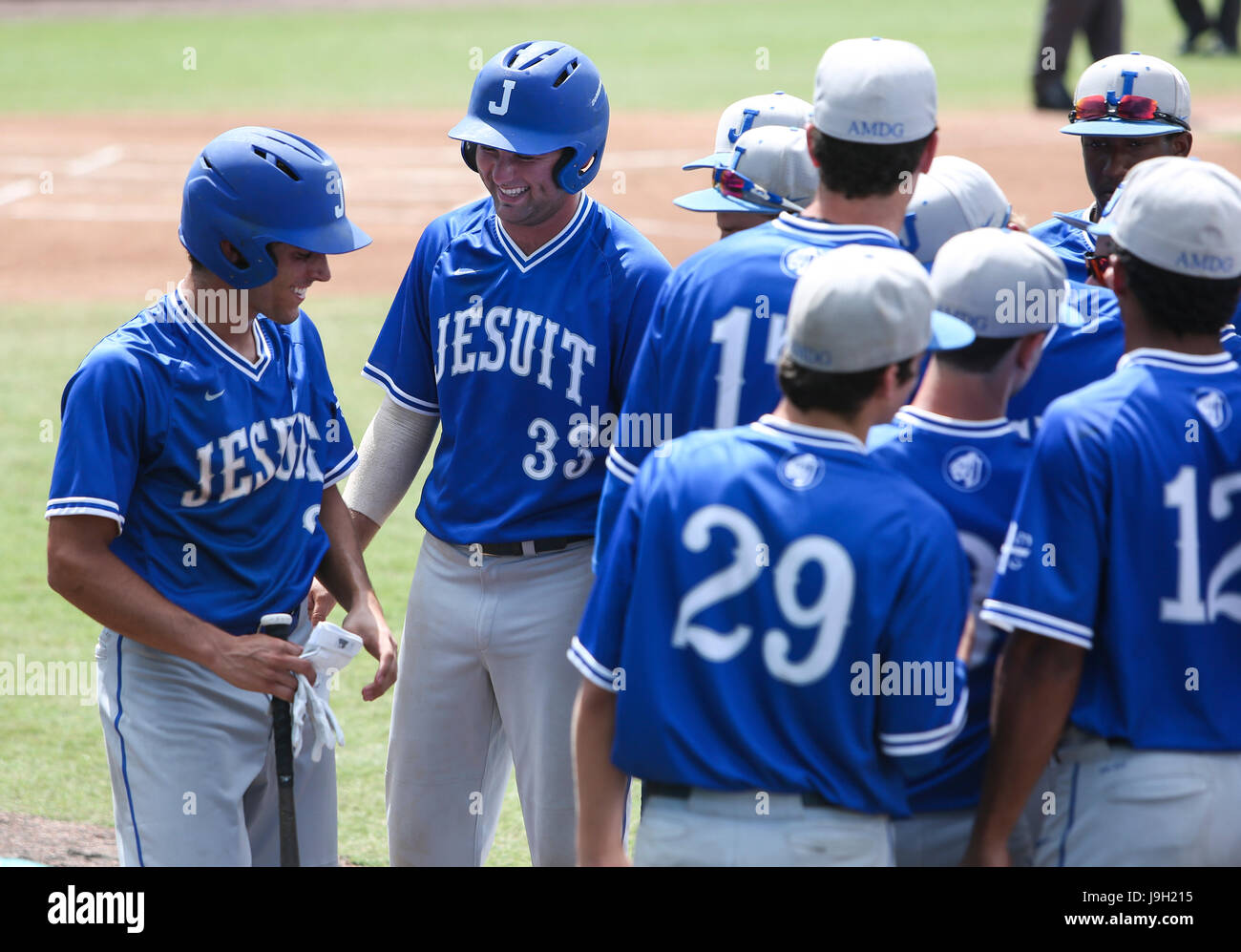 Fort Myers, Florida, USA. 1st June, 2017. MONICA HERNDON | Times.Thomas Bencivenga (33) of Jesuit High School Tigers laughs with teammates before the class 6A semifinal at Hammond Stadium in Fort Myers, Fla., on June 1, 2017. Jesuit defeated Dunedin 7 to 0. Credit: Monica Herndon/Tampa Bay Times/ZUMA Wire/Alamy Live News Stock Photo