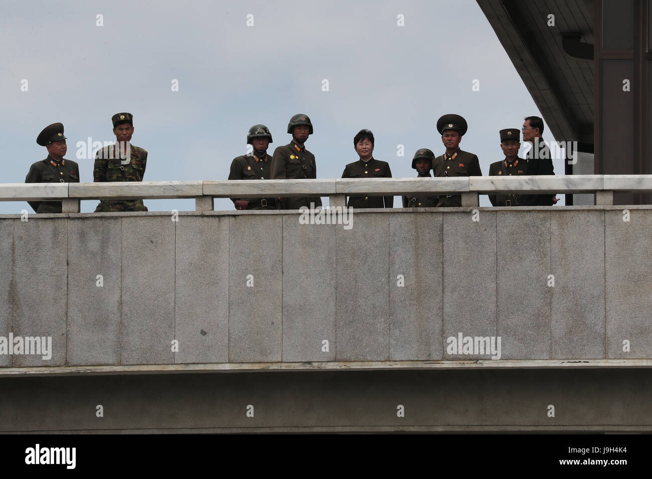 N. Korean soldiers at Panmunjom A group of North Korean soldiers looks ...