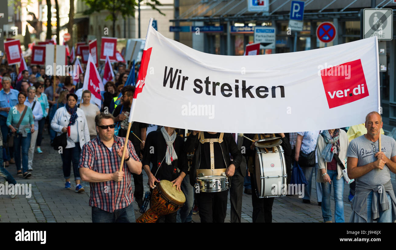 Two Protestors Hold A Banner With The Wording Wir Streiken Lit We Stock Photo Alamy