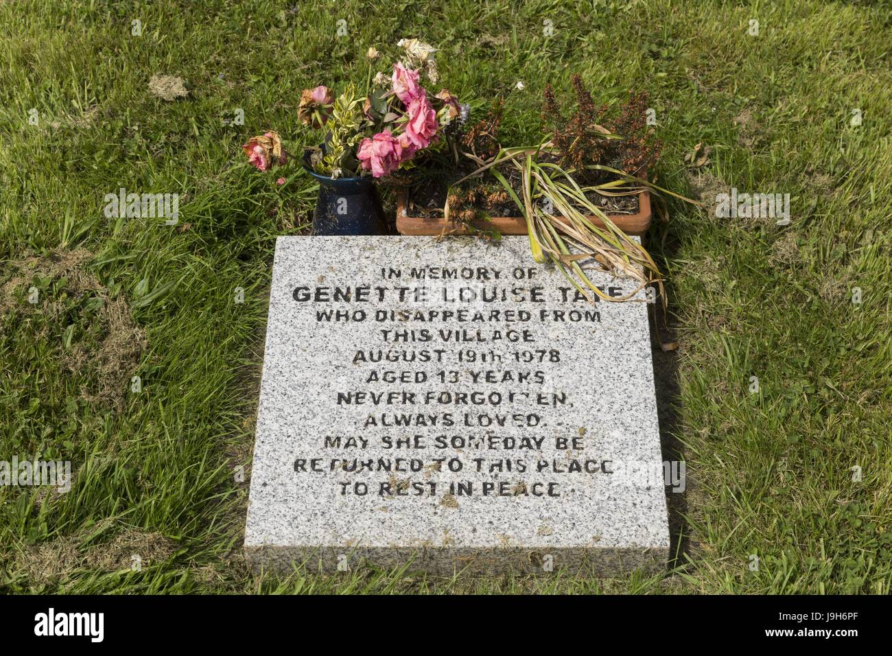 Aylesbeare, Devon, UK. 22nd May, 2017. A plaque commemorating Genette Tate in the churchyard at St Marys church, Aylesbeare, Devon, Genette disappeared from the village inj 1978. Councillor Peter Faithful  is running for Parliament with an unusual manifesto - to discover Gennette's remains. Her disappearance was Britain's longest ever missing person investigation. Credit: Photo Central/Alamy Live News Stock Photo