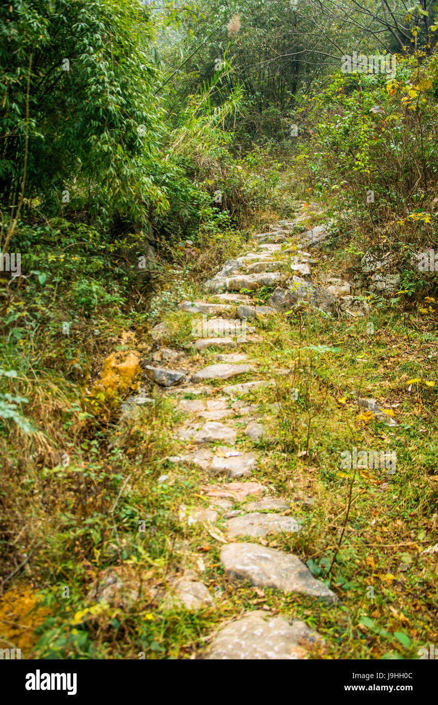 The ancient stone path in the mountain Stock Photo - Alamy