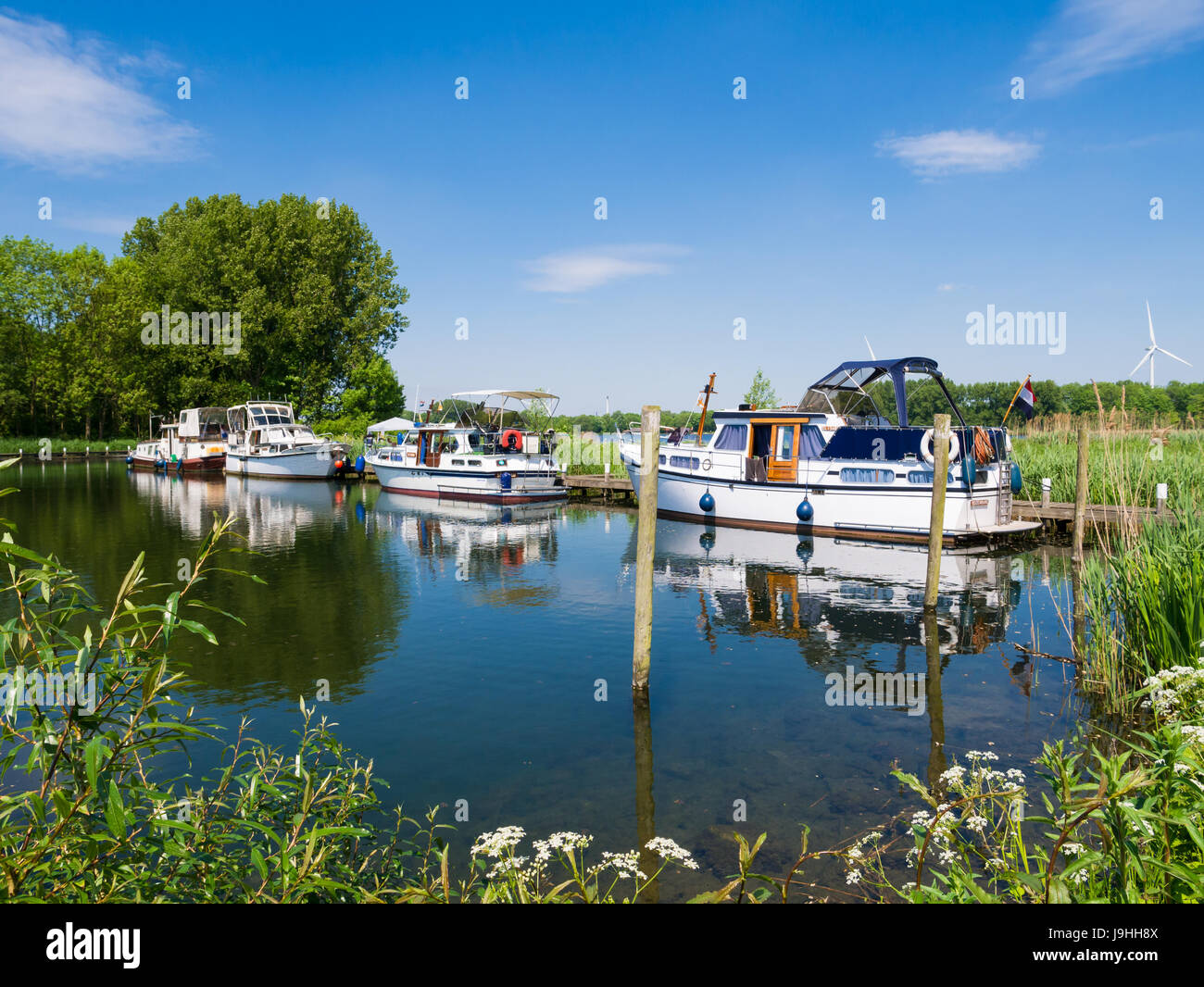 Recreation area with motor yachts at Lake Brielse Meer near Brielle, South Holland, Netherlands Stock Photo