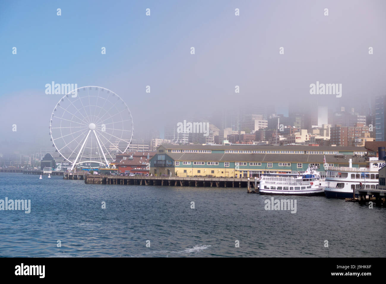 The wharf at Seattle as seen from the upper deck of a car ferry. Stock Photo