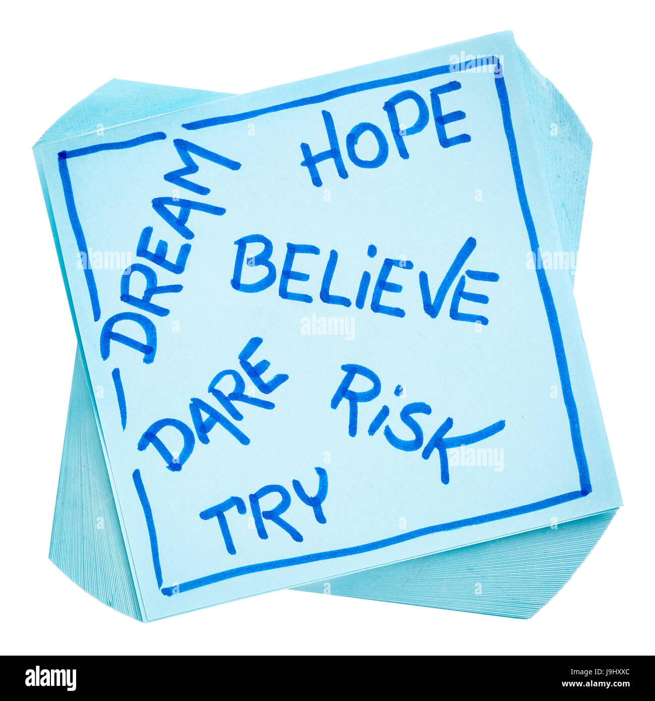 dream, hope, believe, dare, risk, and try - motivational concept - hnadwriting on an isolated sticky note Stock Photo