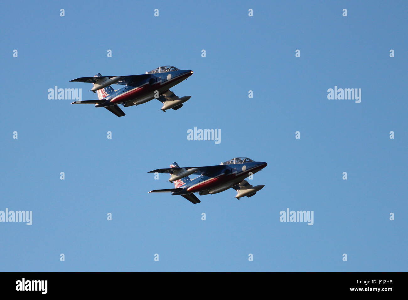 Dassault-Breguet/Dornier Alpha Jet Es of the French Air Force's aerobatic team, the Patrouille de France, arriving at Prestwick Airport in Ayrshire. Stock Photo