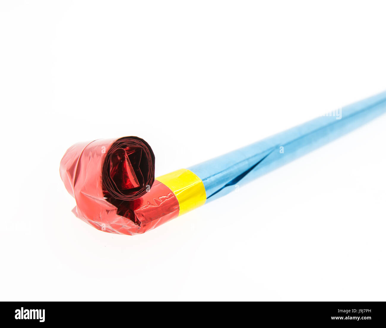Party horn isolated on white background Stock Photo - Alamy