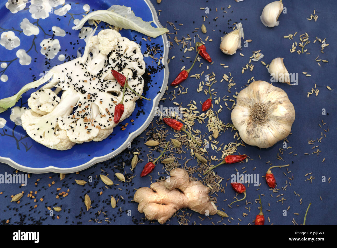 Spices and vegetables for a curry Stock Photo