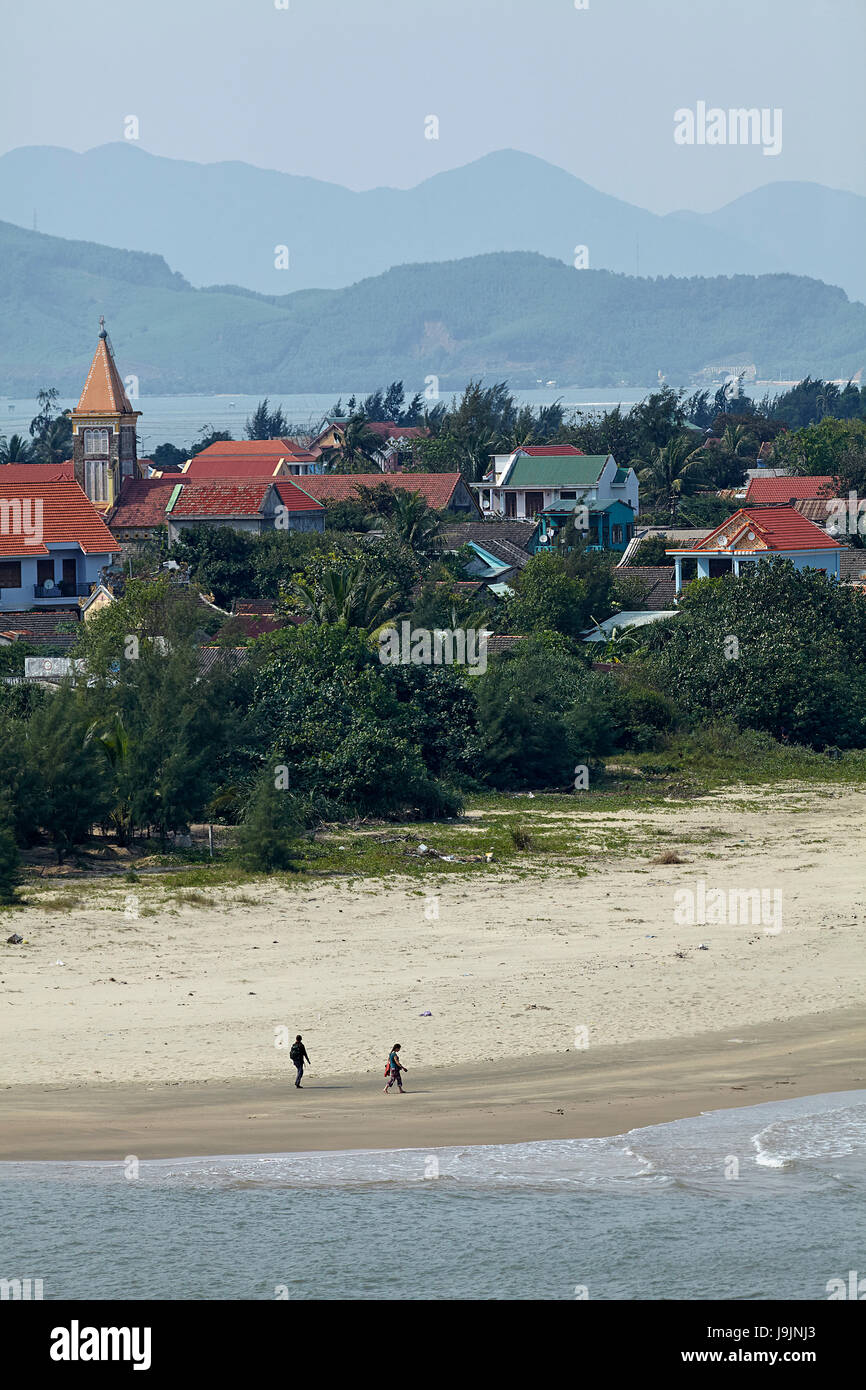 People walking on Lang Co Beach, Thua Thien-Hue Province, North Central Coast, Vietnam Stock Photo