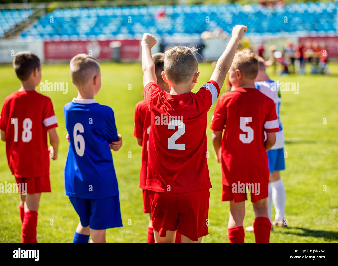 Successful soccer players trophy hires stock photography and images