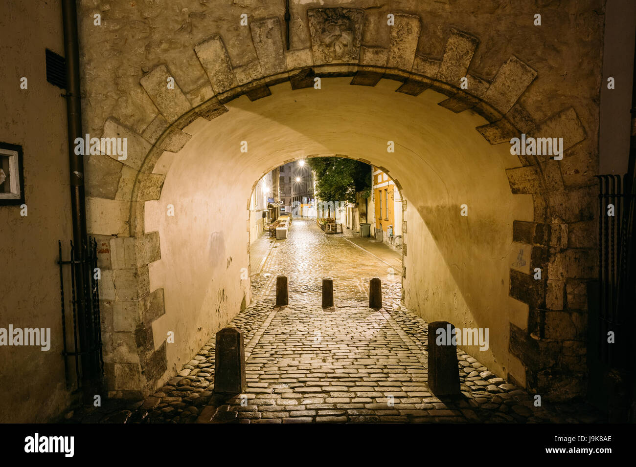 Riga, Latvia. Swedish Gate Gates Is A Famous Landmark. Old Arch Of Swedish Gate In Original State On Troksnu Street In Old Town. Cultural Monument In  Stock Photo