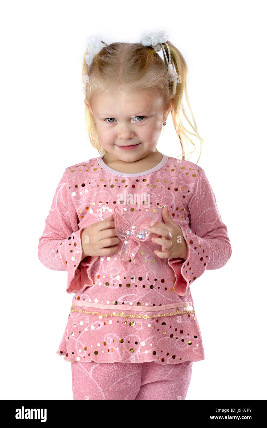 Studio portrait of a curious shy little girl with blond hair isolated ...