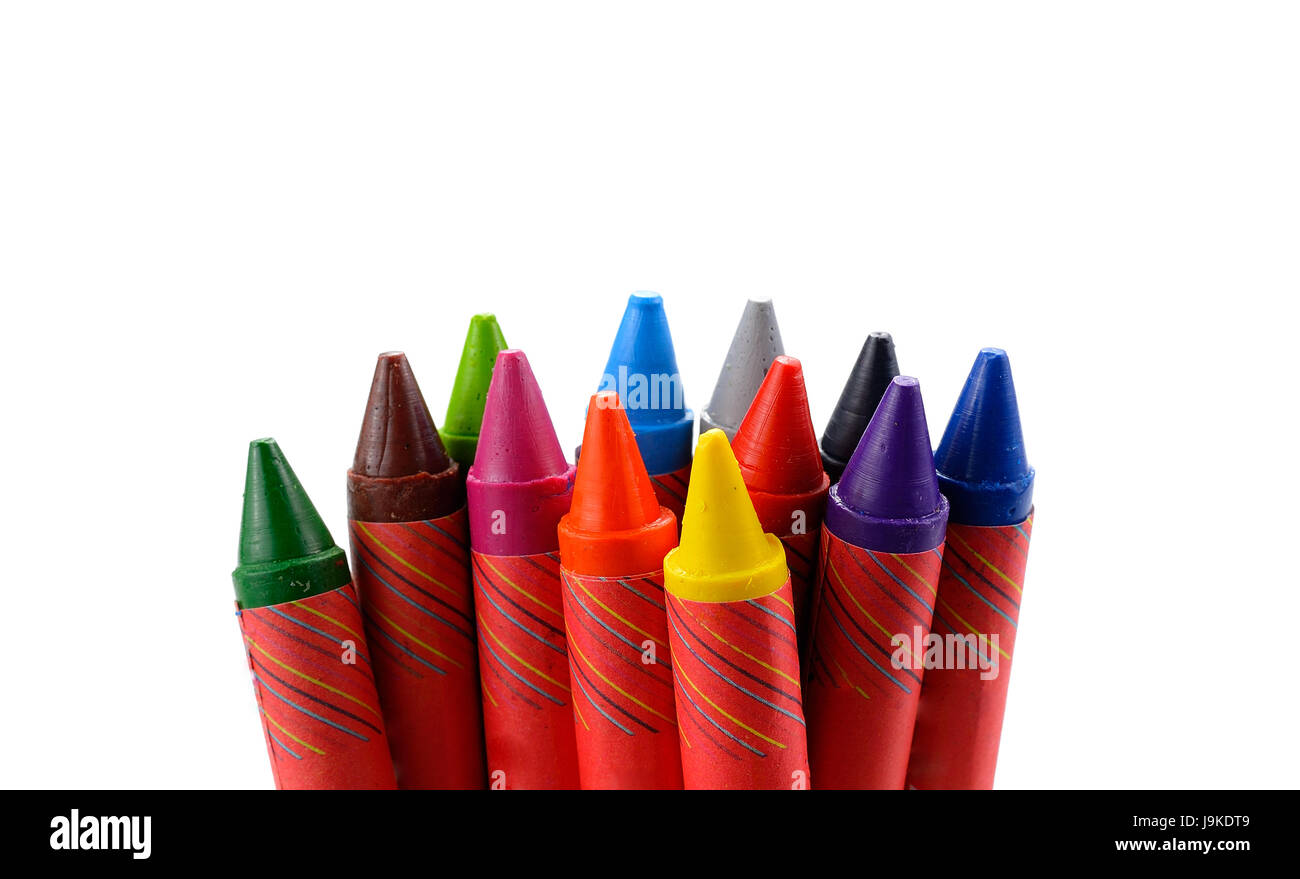 Crayons lined up in rainbow isolated on white background Stock Photo