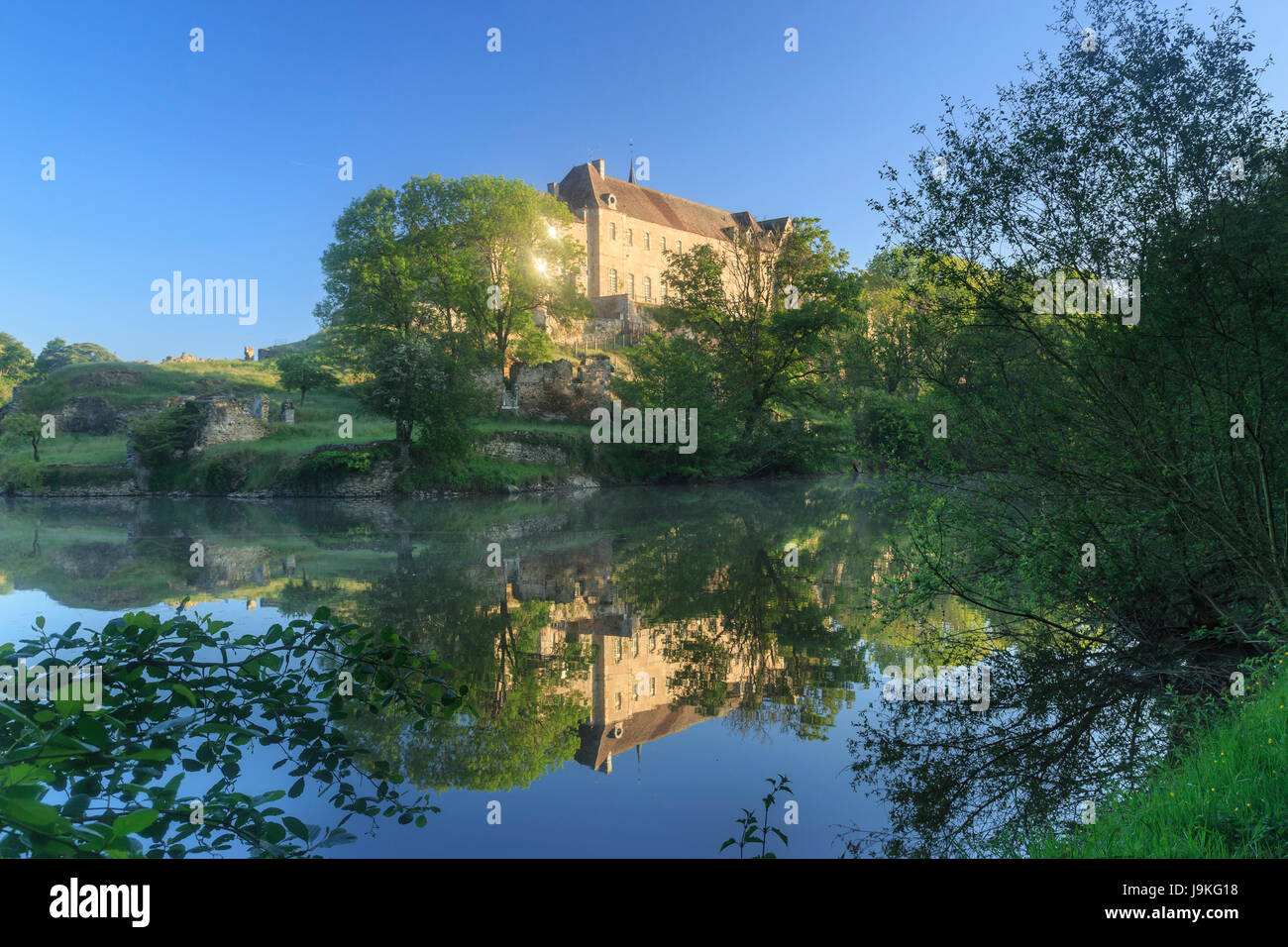 France, Indre, Saint Benoit du Sault, labelled Les Plus Beaux Villages de France, water retention on the Portefeuille and the Priory in the morning Stock Photo