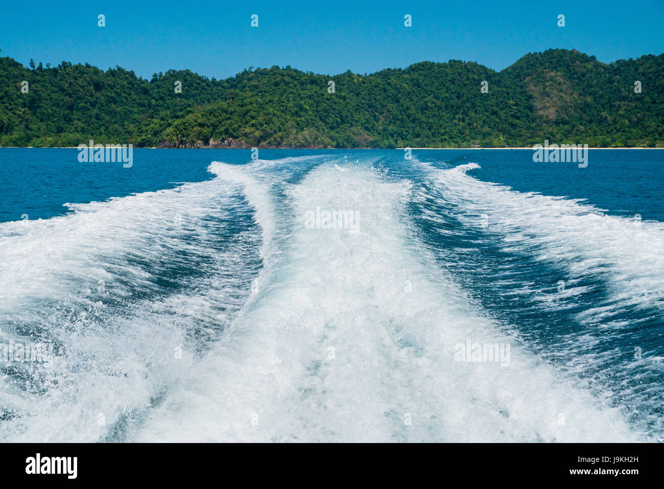 view water stream behind the speed boat day time Stock Photo