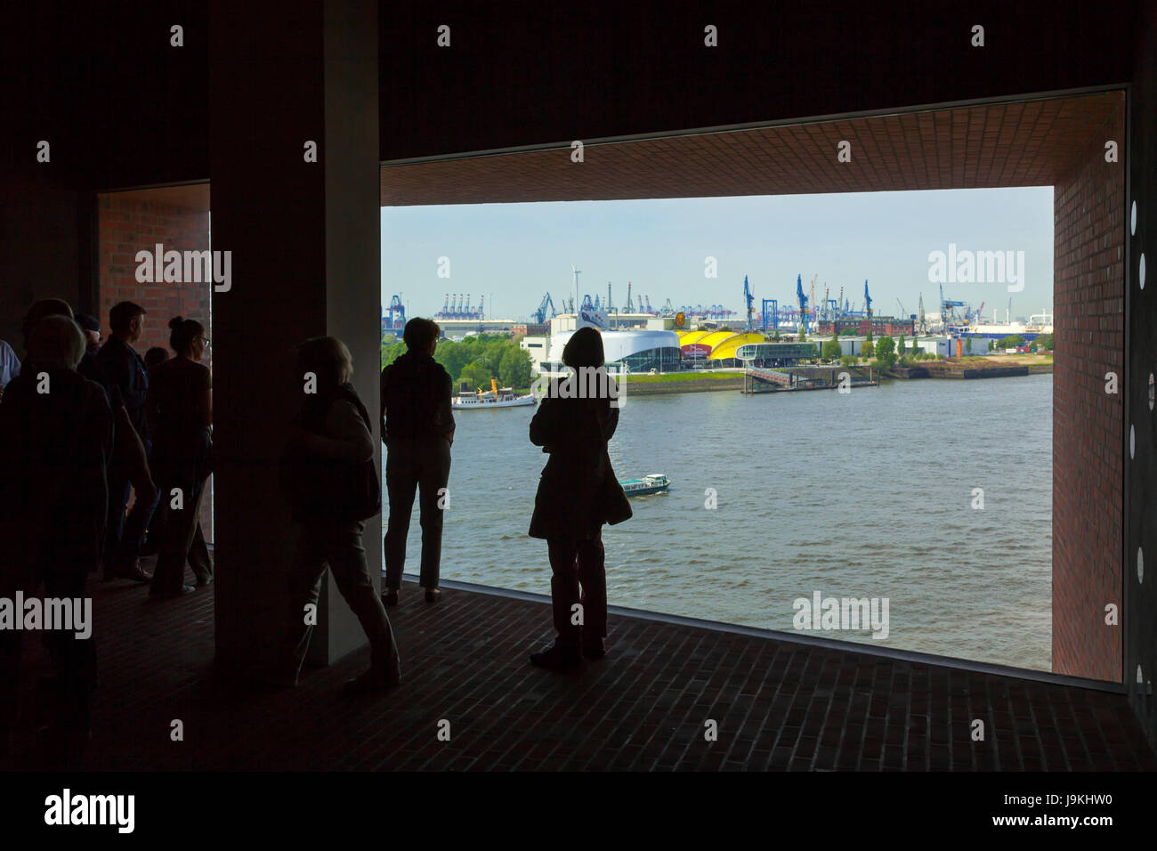 Hamburg, Germany - May 17, 2017: View from the inside of Elbe Philharmonic Hall over to the harbor on south bank of Elbe ricer Stock Photo