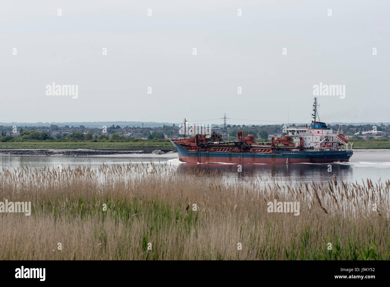 A dredger on the River Thames Stock Photo