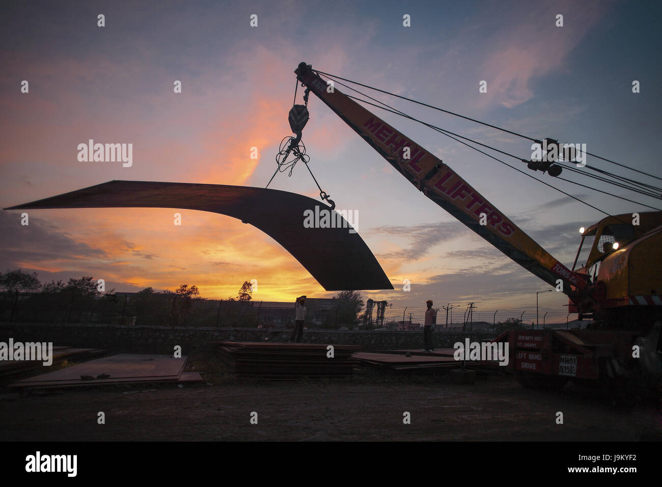 crane lifting heavy steel plate, India, Asia Stock Photo Alamy