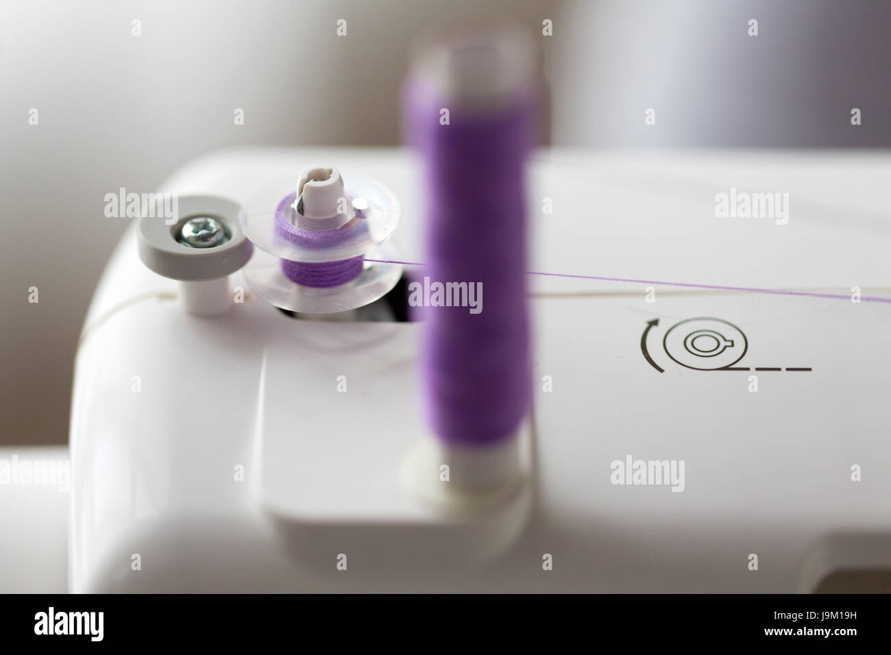 thread spools on sewing machine Stock Photo Alamy