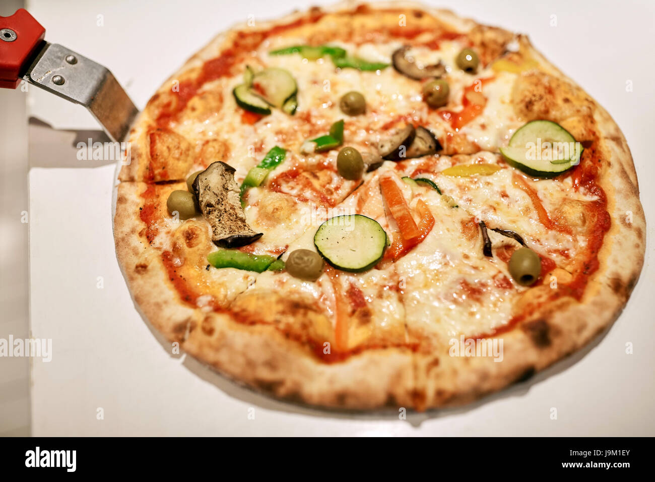 Close Up Of Pizza On Peel At Pizzeria Stock Photo Alamy