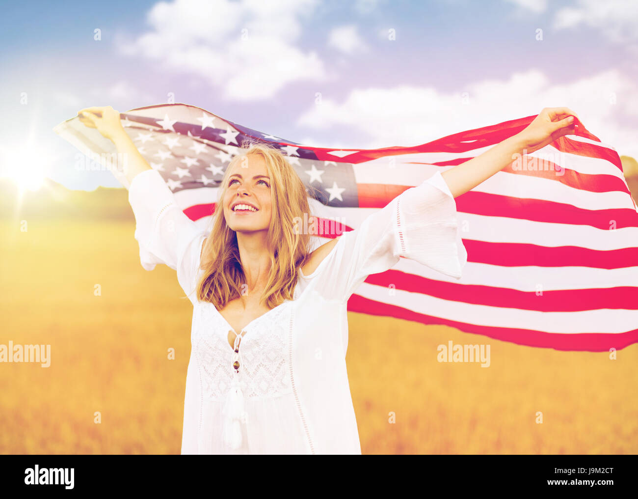 Teen holding american flag hi-res stock photography and images - Alamy