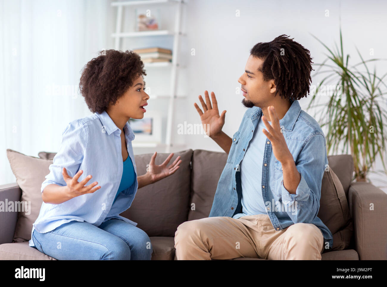 unhappy couple having argument at home Stock Photo - Alamy