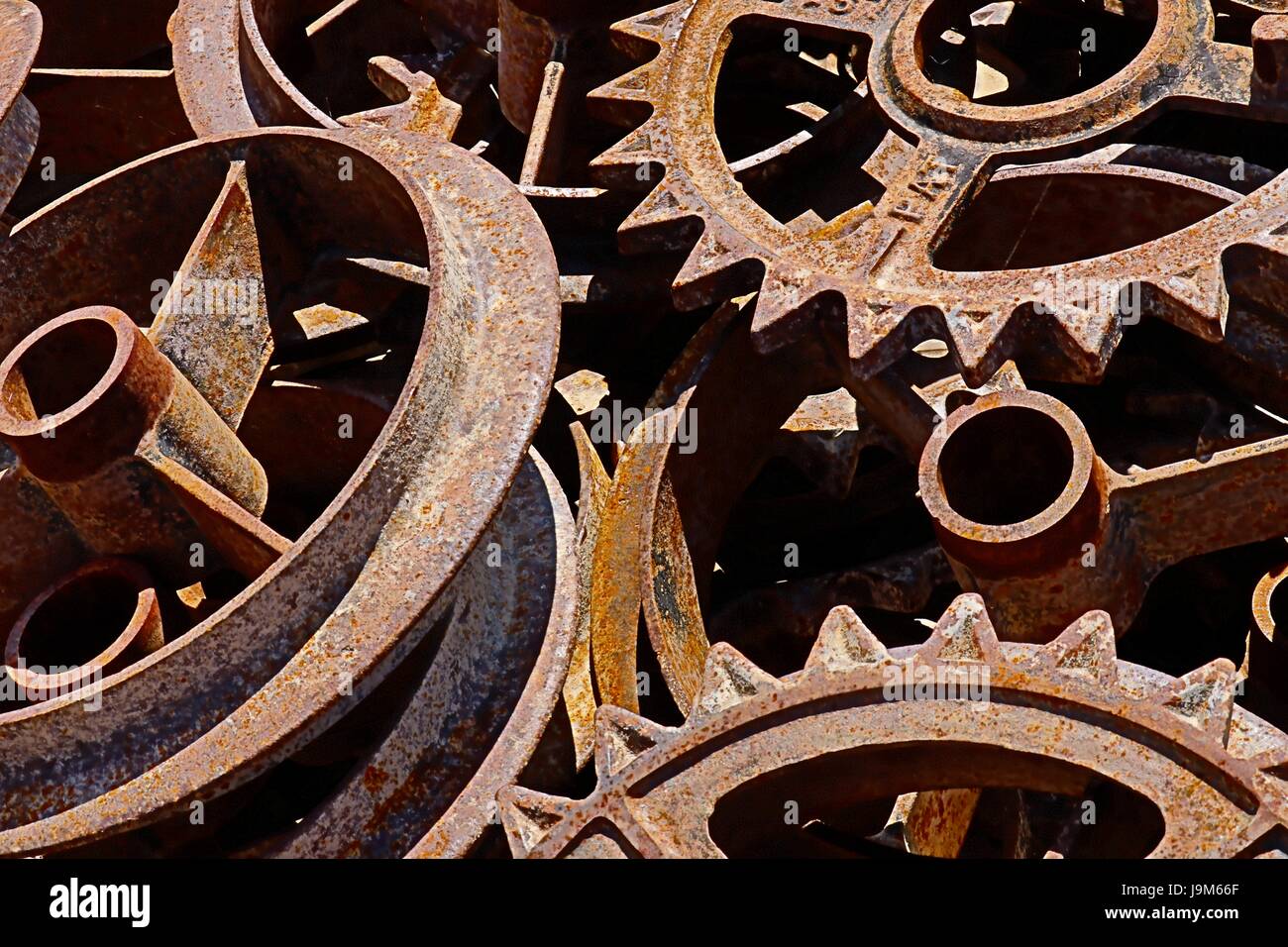 A pile of old rusted Gears at a junkyard Stock Photo - Alamy