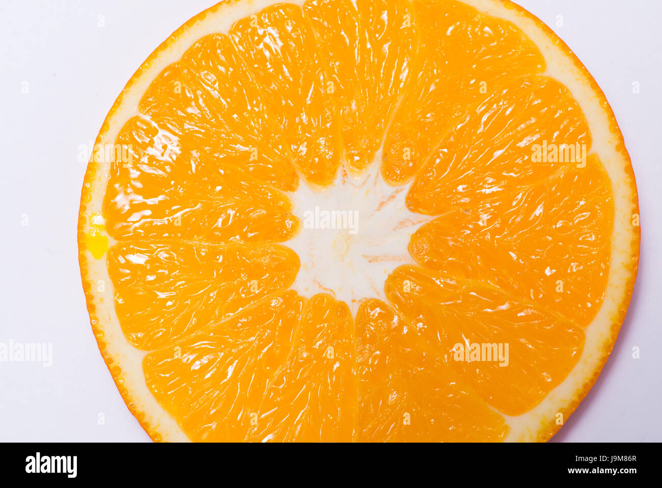 Orange slice isolated on white background Stock Photo - Alamy