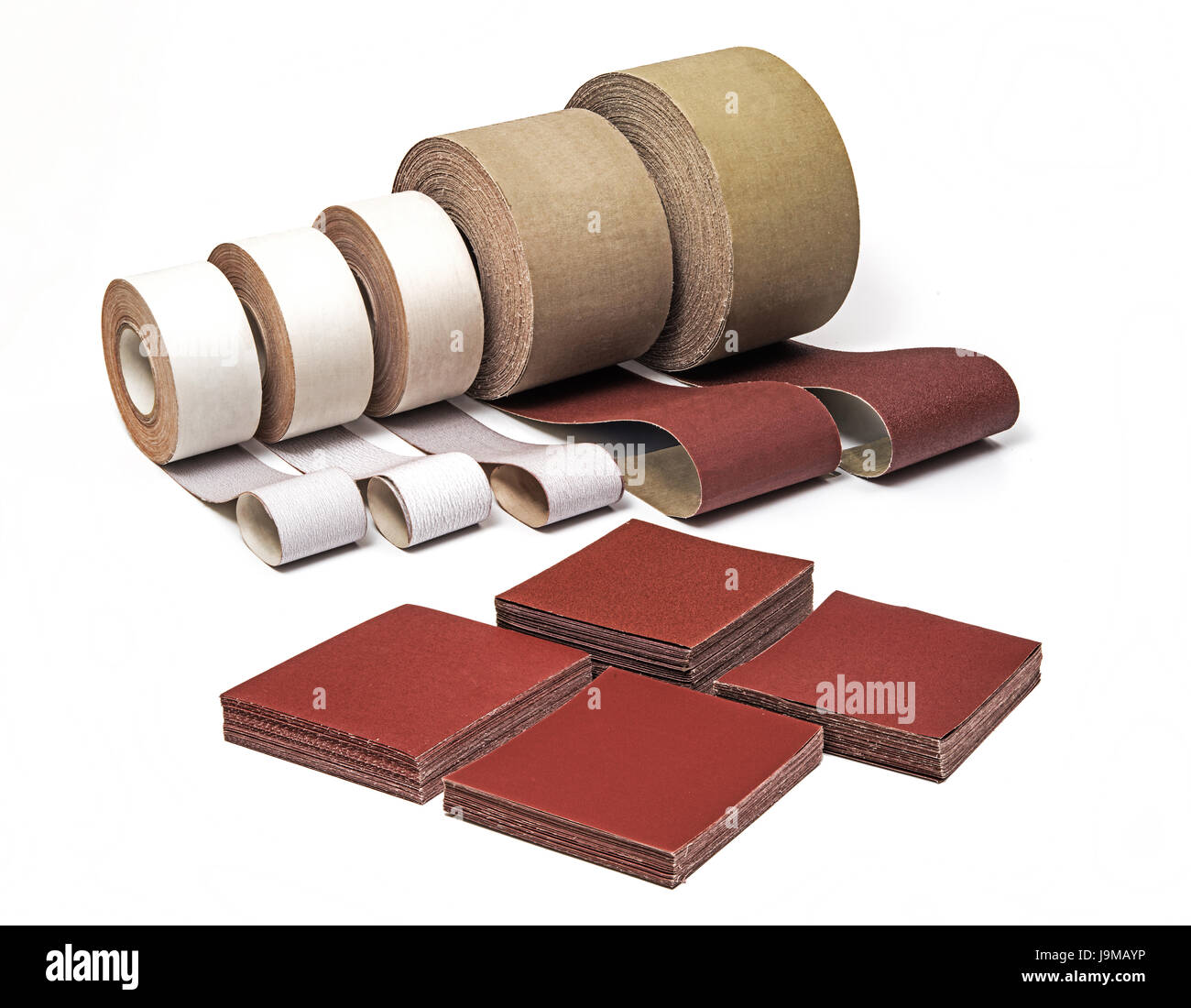 Sandpaper in Rolls and Sheets for Industrial Use in Different Sizes and Thickness on White background Stock Photo
